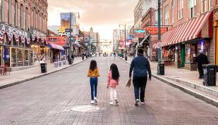 Family strolling Beale Street