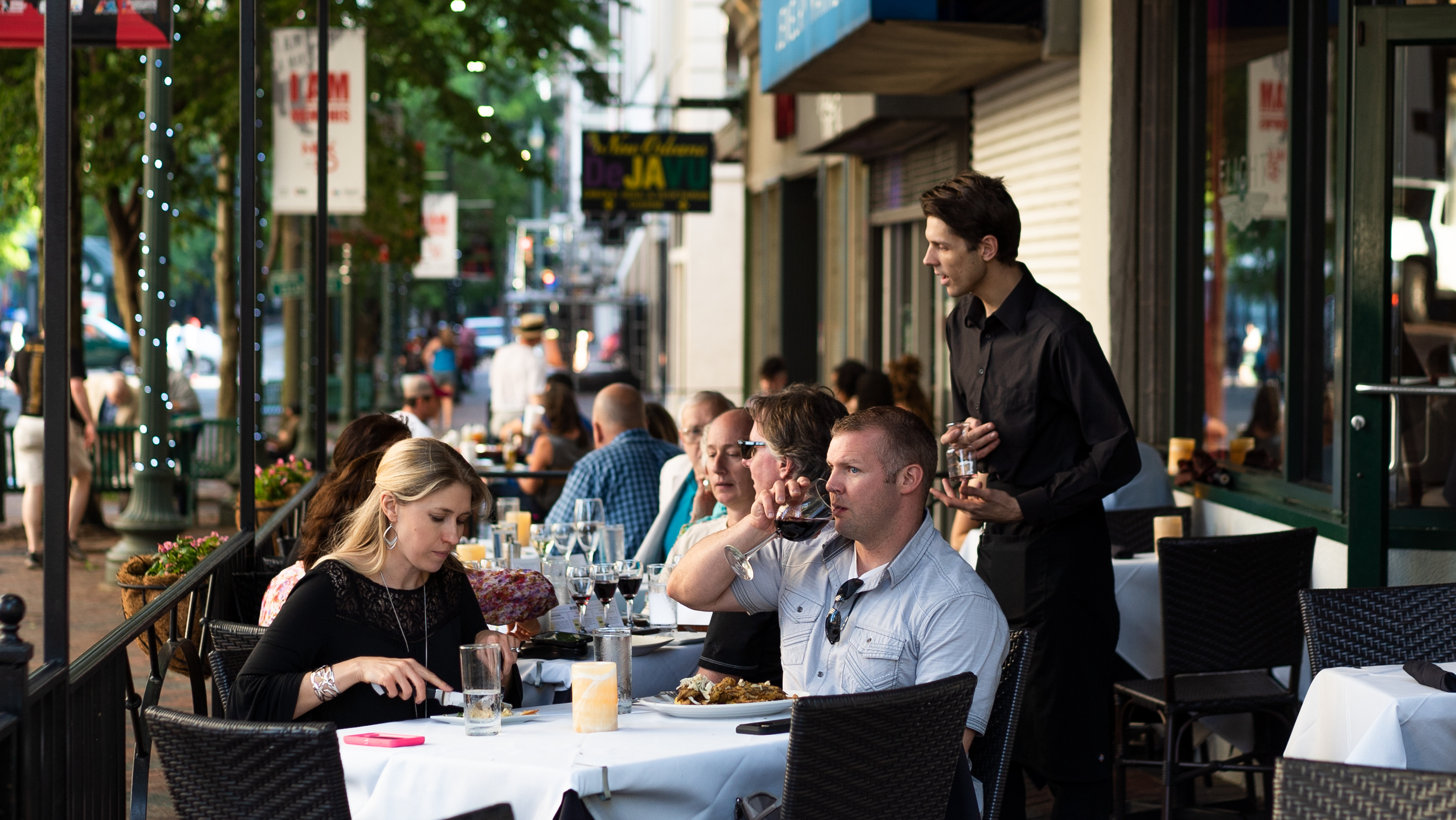 people eating on patio of Flight Restaurant