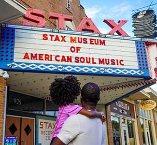 Dad and daughter outside the Stax Museum of American Soul Music in Memphis | The Traveling Child