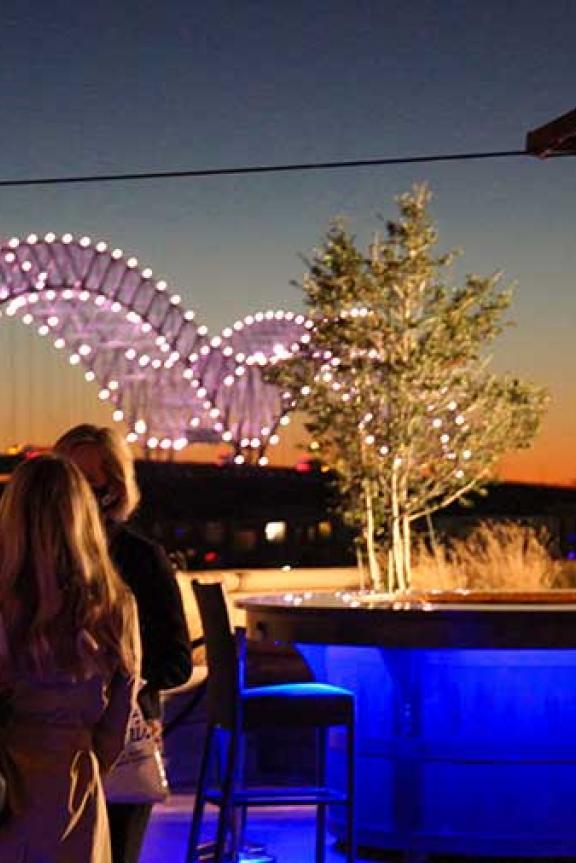 A group gathers on Bass Pro Shops' Mississippi River Terrace in Memphis