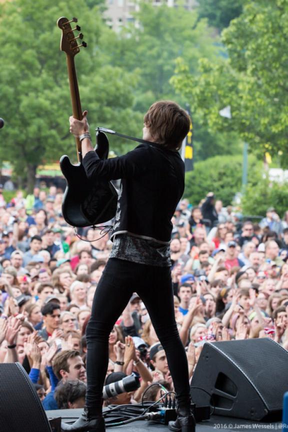 Performer in front of massive crowds at Beale Street Music Festival.