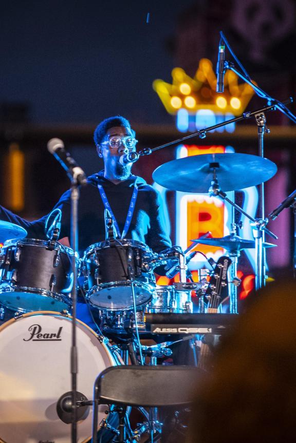 the PRVLG drums on Beale Street in front of neon B.B. King sign