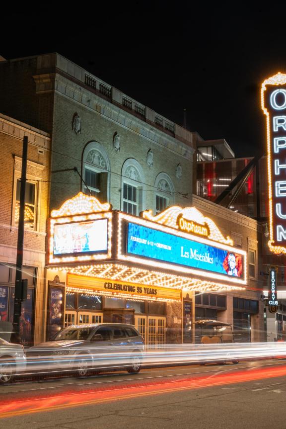 Timelapse outside of Orpheum Theatre at night.