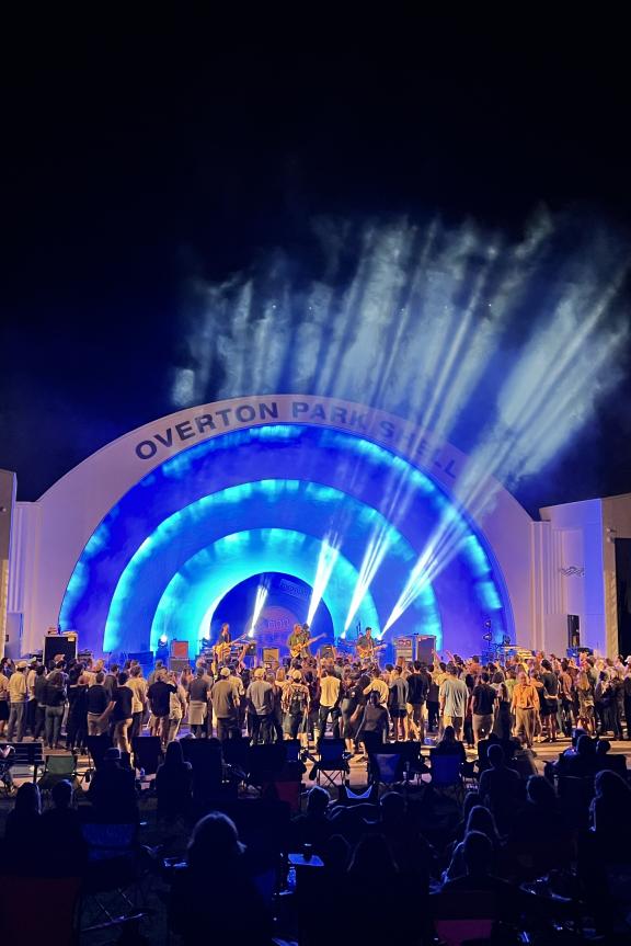 A crowd gathered for an Overton Park Shell concert at night. 