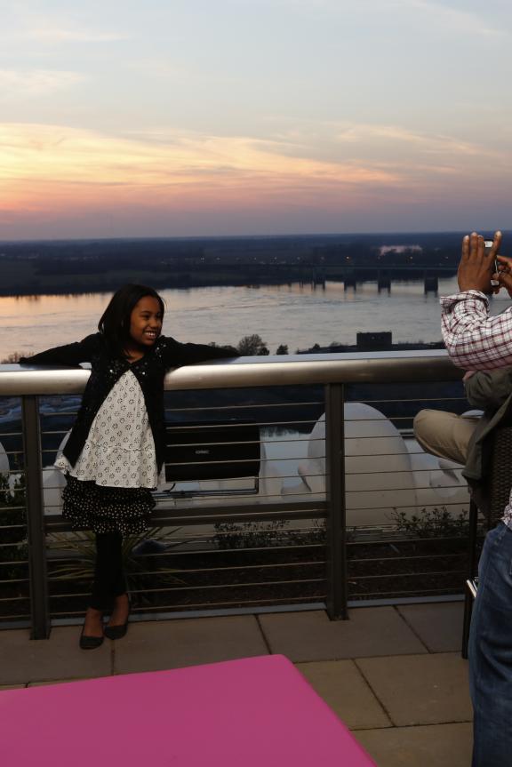 Family at Twilight Sky Terrace at the Madison Hotel. Photo Credit: Justin Fox Burks