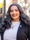 Jillian Melton smiles for headshot in downtown memphis