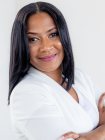 Talisha Sims headshot in white shirt