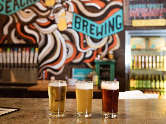 Three beers on the bar of Wiseacre Taproom on Broad Avenue in Memphis, Tennessee