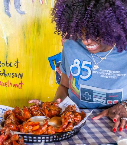 girl eating wings