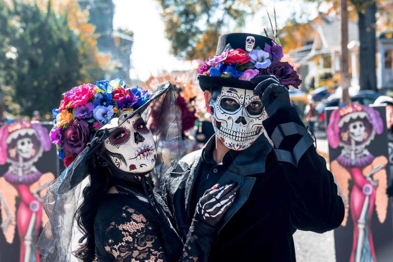 two people in sugar skull face paint