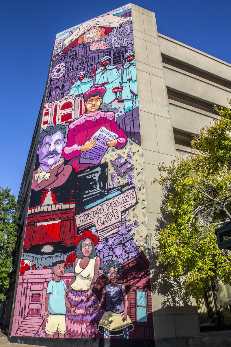 civil rights mural on side of parking garage