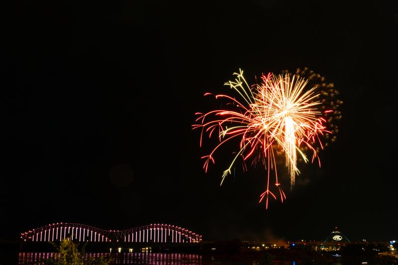 fireworks over bridge and skyline in downtown memphis