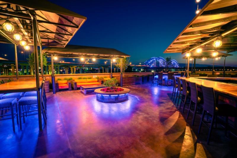 pyramid rooftop patio with fire pits and seating