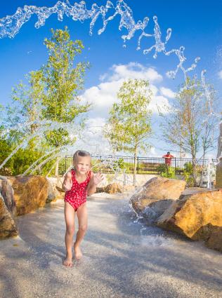 Kids playing at the Shelby Farms splash pad.