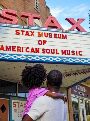 Dad and daughter outside the Stax Museum of American Soul Music