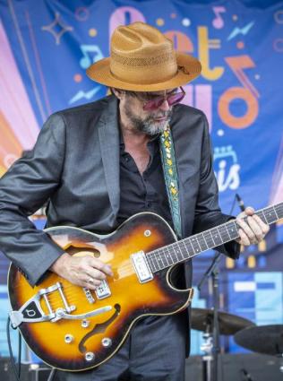 Musician Will Sexton plays guitar on Memphis' Beale Street