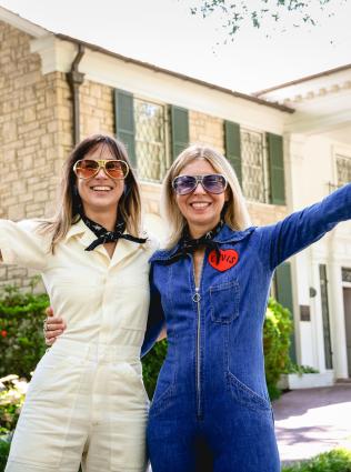 Elvis fans in front of graceland