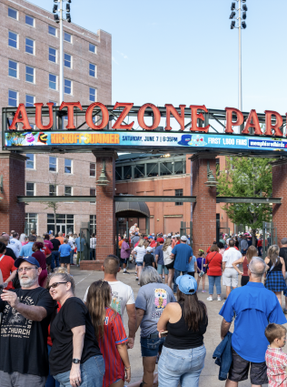 fans stream into AutoZone Park