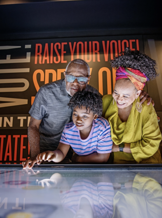 grandparents with grandchild at national civil rights museum