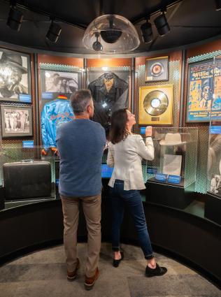 A couple looking at displays at the Blues Foundation's Blues Hall of Fame Museum
