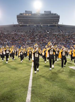 band takes the field during 2023 Southern Heritage Classic
