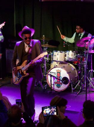 A blues band on stage during the International Blues Challenge.