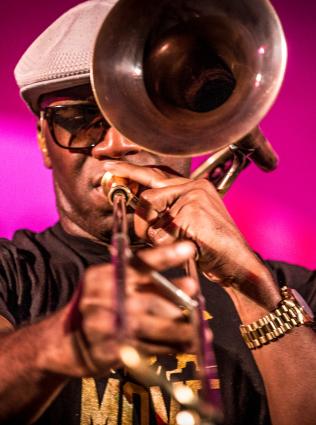 man playing trumpet