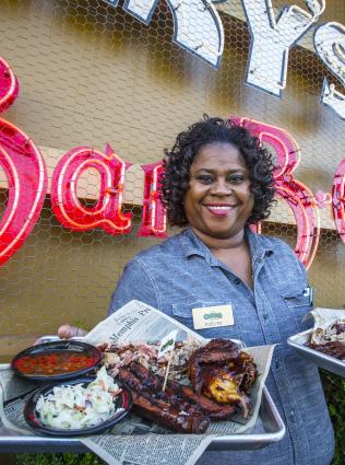woman holds ribs