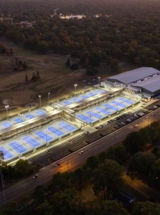 aerial photo of leftwich tennis court lit up at night