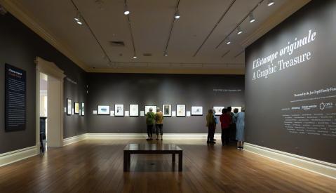 gallery in Dixon with photos on wall in straight line