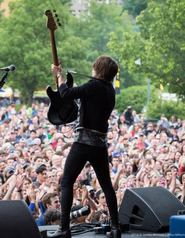 Performer in front of massive crowds at Beale Street Music Festival.