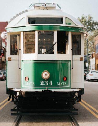 green trolley goes down middle of south main