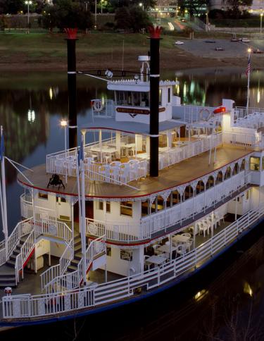 A Memphis Queen riverboat floats on the Mississippi River.