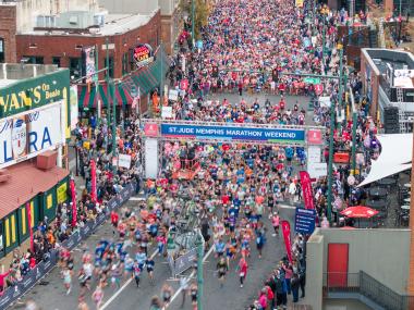 St. Jude Memphis marathon runners take off from starting line at the intersection of Beale Street