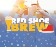 Red Shoe Brew in white and yellow letter with a yellow cartoon of a bubble beer and a red shoe converse cartoon