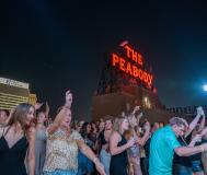 people dancing during Peabody rooftop party