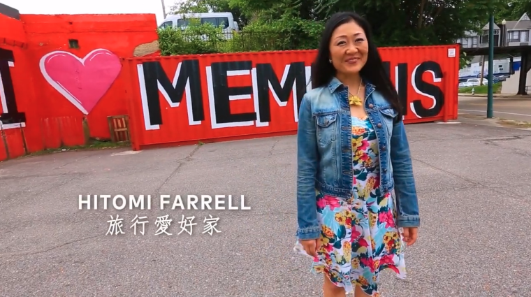 woman stands during video segment
