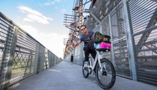 Bikers on Big River Crossing Pedestrian Bridge Photo