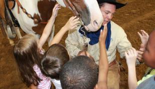 Children participate in Cowboy Up at the Agricenter International Photo