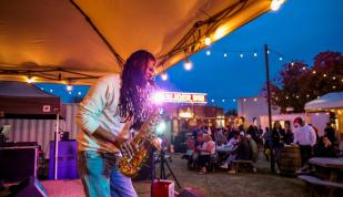 Slider Inn Patio Entertainment on trolley night Photo