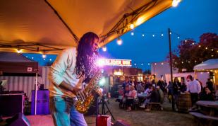 Slider Inn Patio Entertainment on trolley night Photo