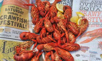 Crawfish on Newspaper advertising the Crawfish Festival