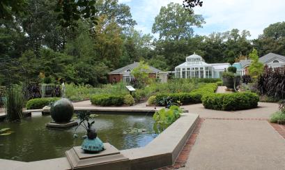 dixon garden with pool, fountain, and greenhouse