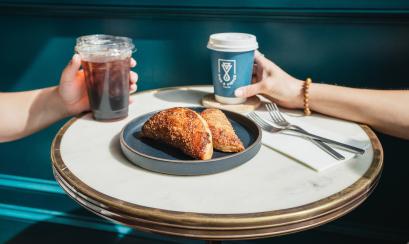 arrive pastry on table with coffee