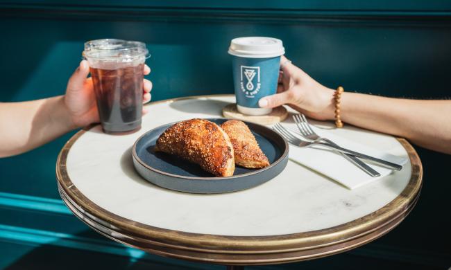 arrive pastry on table with coffee