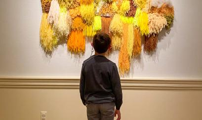 Kid enjoying art at The Dixon