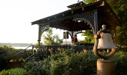 Metal gazebo overlooking Mississippi River and bell at Metal Museum