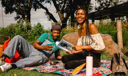 couple has a picnic at River Garden Park Summer