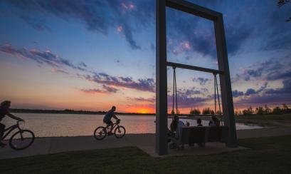bike riders at Shelby farms during sunset