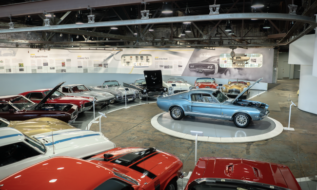 sports vehicles on display in motor museum